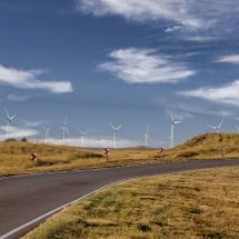 Wind turbines along a road in Chubut, Argentina