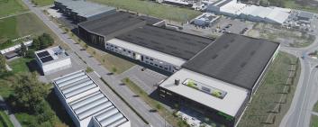 This computer-generated image illustrates the expansion project of the Eversys production facility in Sierre.