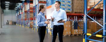 Distribution warehouse manager and client businesswoman