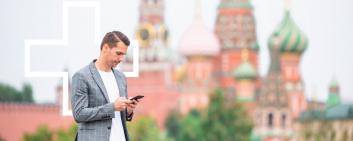 Man using smartphone in Moscow